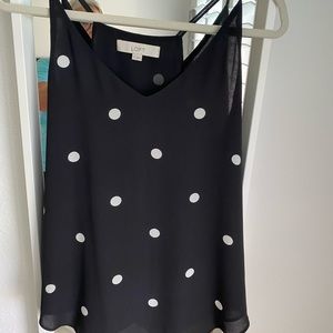 Pretty Pok-a-dots! Fully lined black with white polkadots camisole.